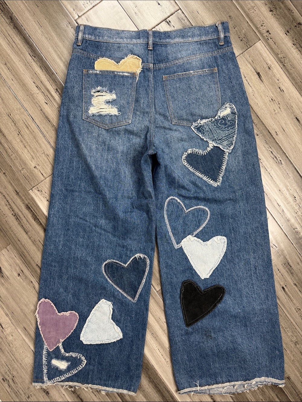 FREE PEOPLE WE THE FREE PIECE OF MY HEART PATCHWORK DISTRESSED WIDE LEG JEANS - Picture 7 of 14